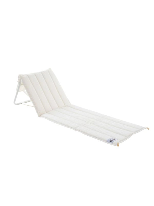 House of Dune Oyster Tide folding beach lounger with off-white quilted cushioned cover, backrest raised, on a white background.