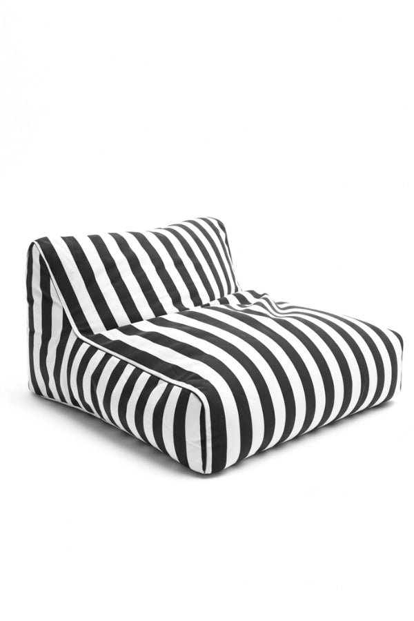 Front view of the Orca Stripe floating pool lounger in bold black and white stripes, designed for luxury poolside living.