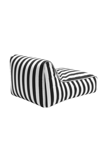 Back angle of the House of Dune Orca Stripe Floating Lounger showing its bold black and white vertical stripe design and relaxed, contoured shape.