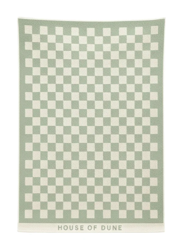 Full view of the Salted Sage checkerboard towel from House of Dune laid flat, showing its minimalist green and cream design.