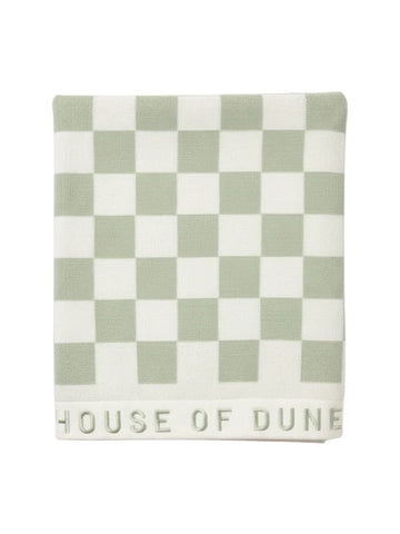 Folded Salted Sage checkered towel from House of Dune neatly displayed, highlighting its premium cotton texture and subtle branding.