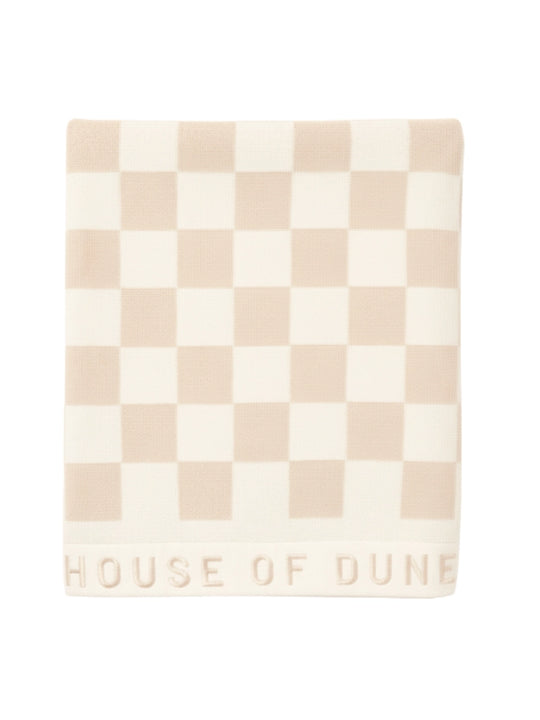 Folded Sand Drift checkered towel from House of Dune, highlighting its premium cotton weave and minimalist style.