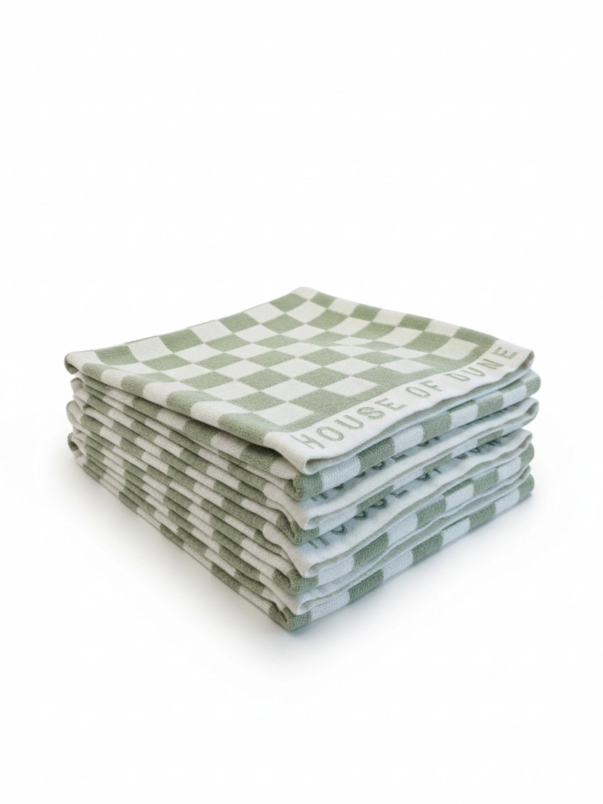 Four House of Dune Salted Sage beach towels folded and stacked, alternate angle showing the sage and white check.