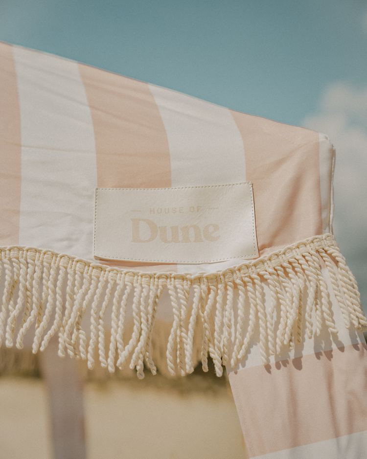 The woven Dune label on a Sand Drift Beach Cabana